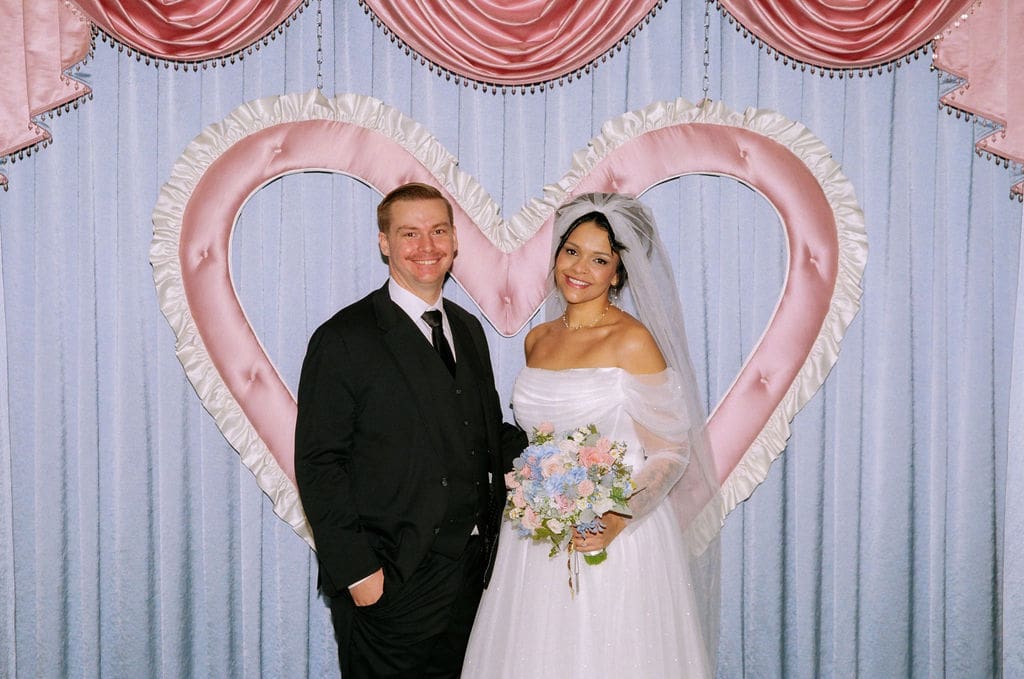 bride and groom smiling at each other during their photoshoot
