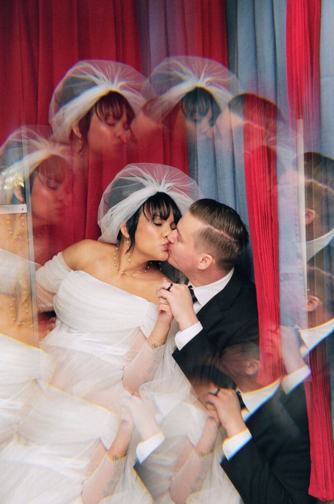 cute picture of the newlyweds kissing