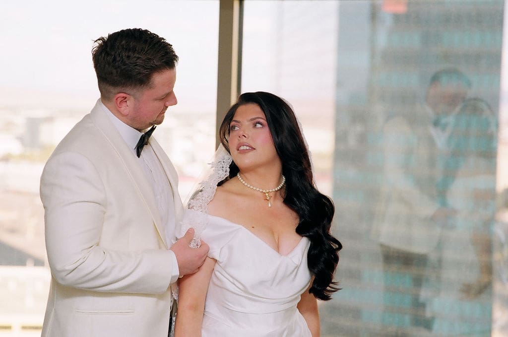 cute picture of the bride and groom smiling at each other