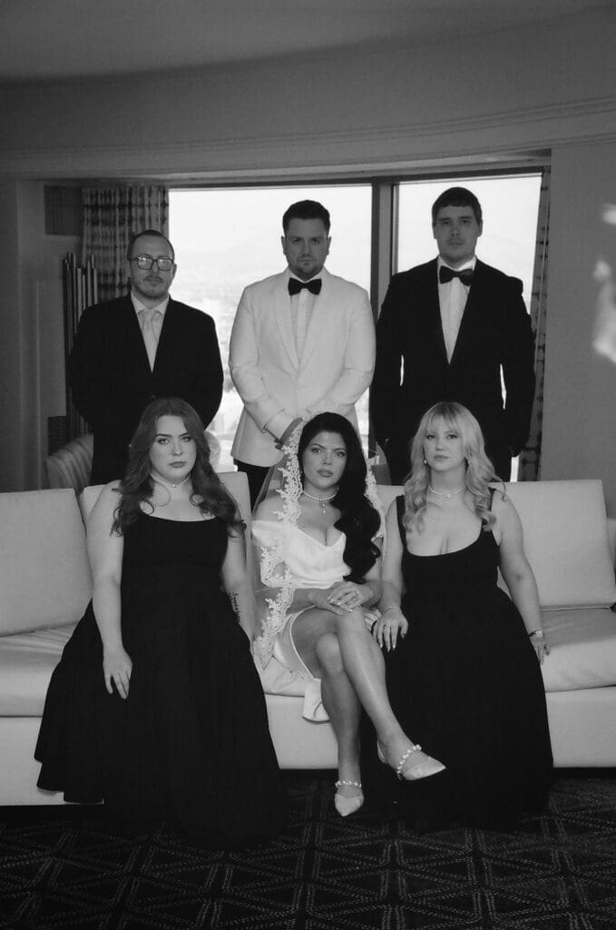 cute picture of the bride and groom with their friends