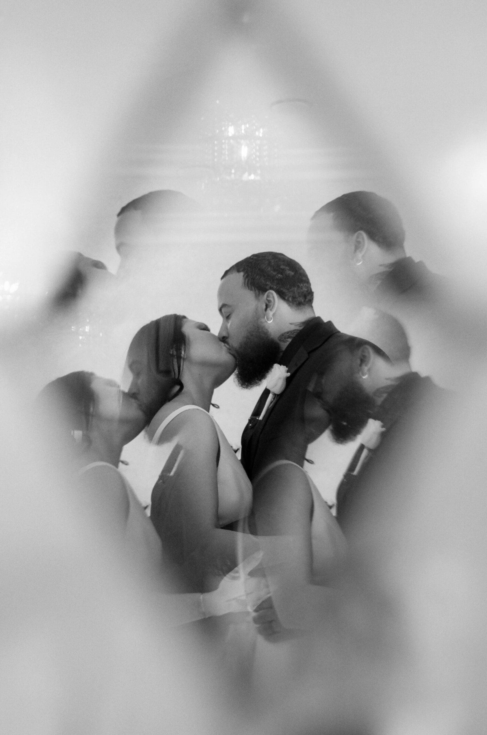 cute picture of the bride and groom kissing
