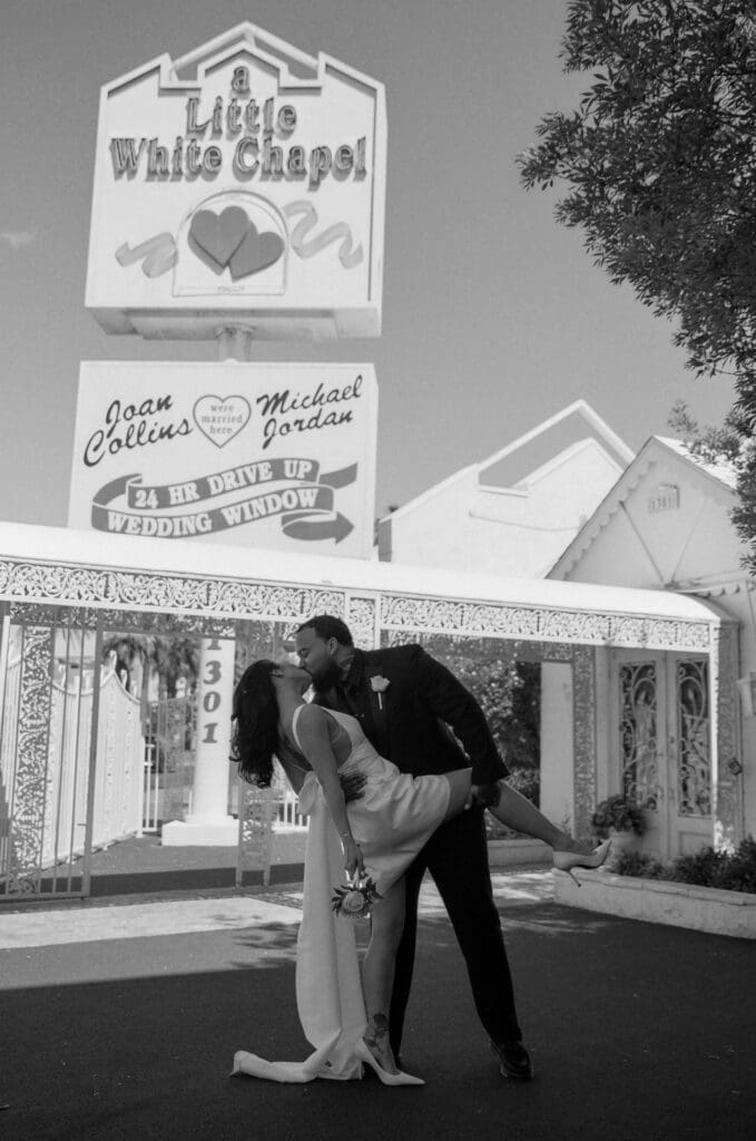 cute portrait of the newlyweds kissing