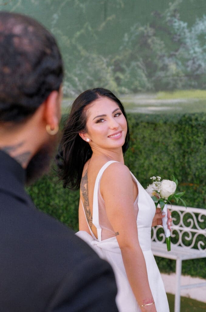 cute picture of the bride and groom smiling at each other