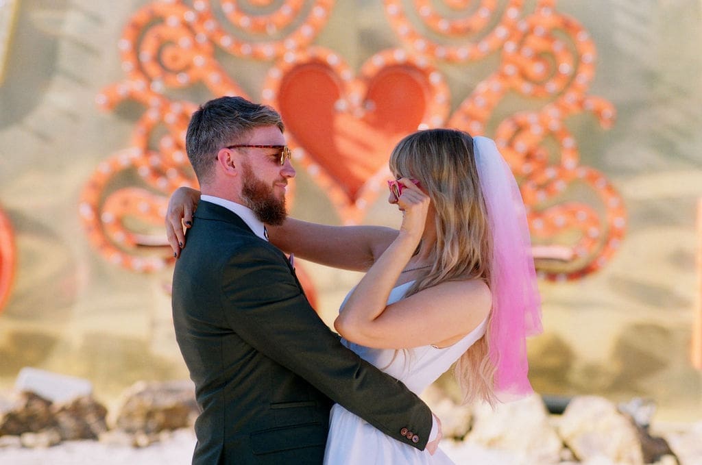 cute picture of the newlyweds smiling at each other