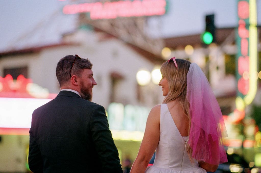 Portrait of the newly married couple holding hands