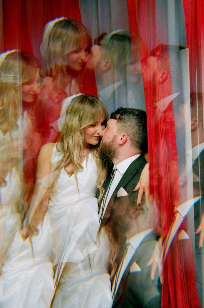cute portraits of the newlyweds kissing