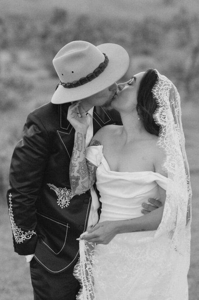 cute picture of the newlyweds kissing