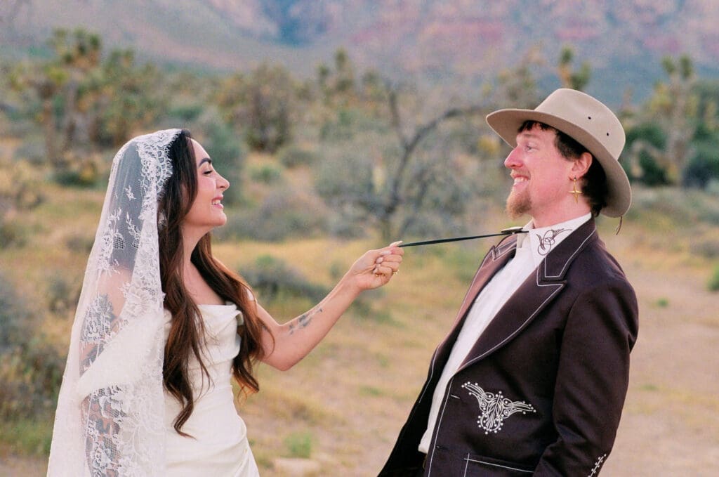 cute picture of the newlyweds smiling at each other