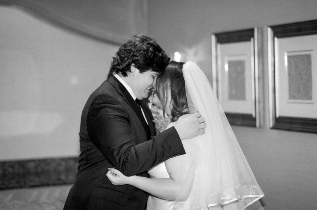 cute picture of the bride and groom smiling at each other
