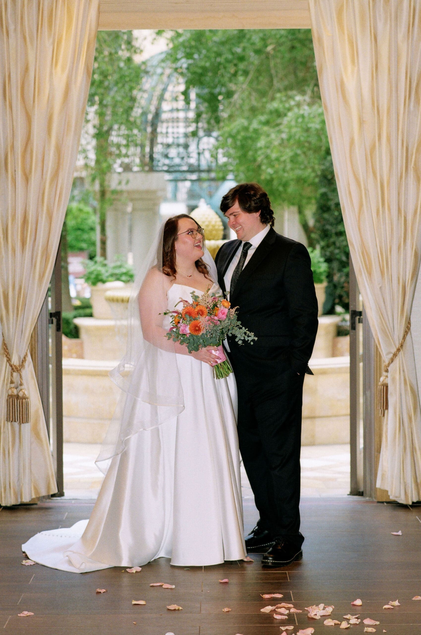 cute picture of the newlyweds smiling at each other