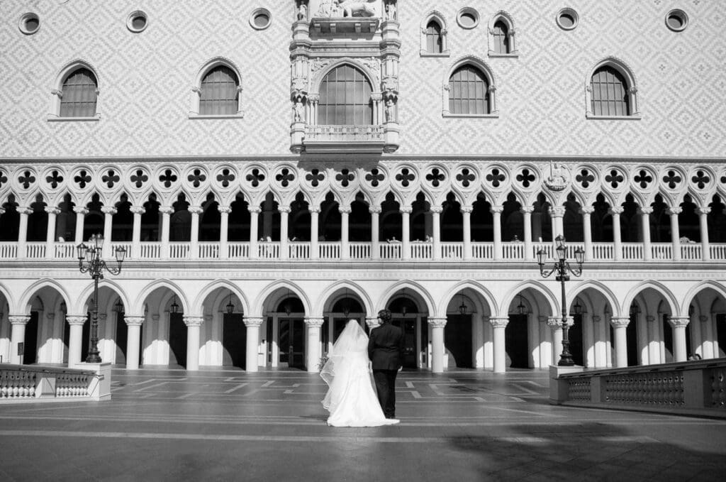 bride and groom holding hands during their bridal photos