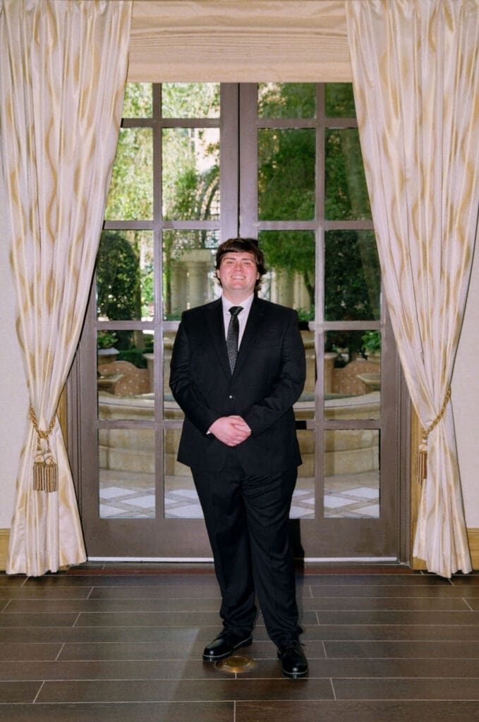 groom watching the bride walk down the aisle