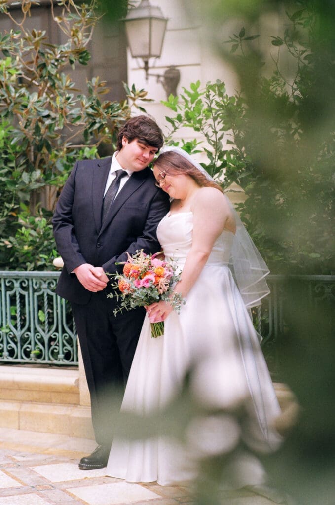 cute picture of the bride and groom hugging