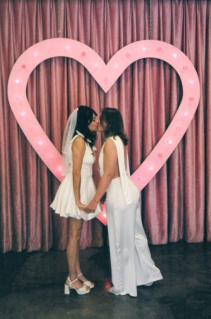 cute picture of the newlyweds kissing