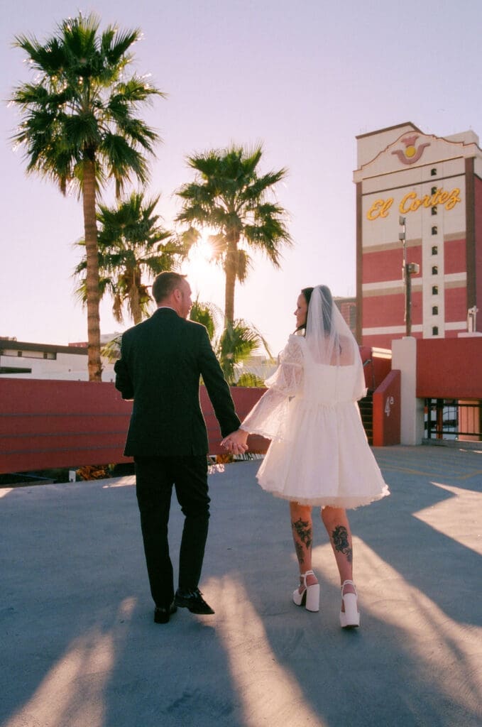 cute picture of the newlyweds holding hands