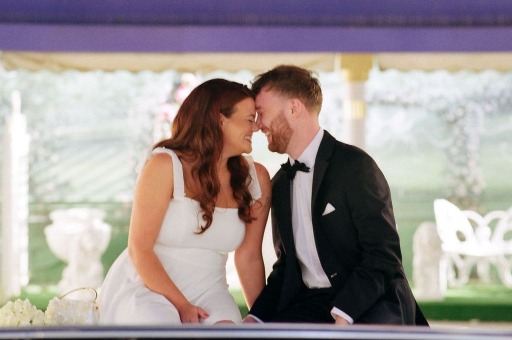 cute picture of the bride and groom, smiling at each other