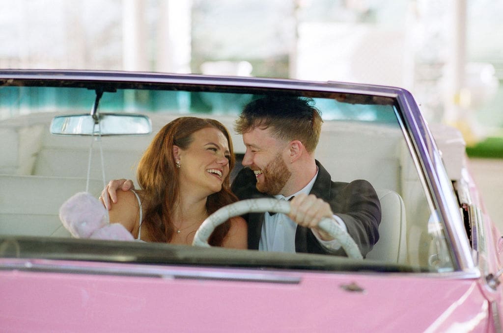 Cute picture of the bride and groom, smiling at each other