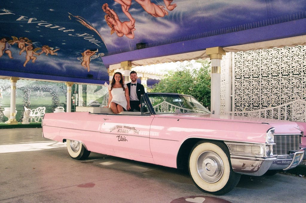 Romantic portraits in the pink Cadillac