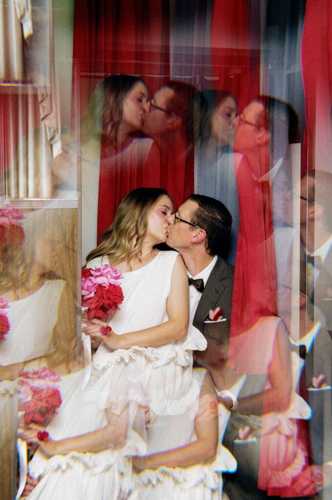 cute picture of the newlyweds kissing